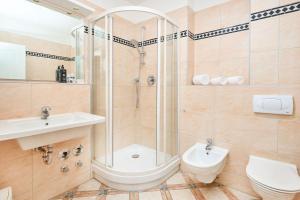 Ein Badezimmer in der Unterkunft Strandhotel Prinz von Preussen