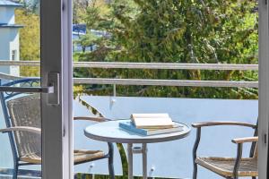 Ein Balkon oder eine Terrasse in der Unterkunft Strandhotel Prinz von Preussen