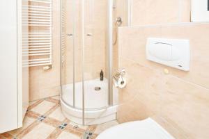 Ein Badezimmer in der Unterkunft Strandhotel Prinz von Preussen