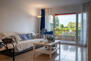 Posezení v ubytování AT310 Planta baja con piscina a 500m de la playa Canyadell