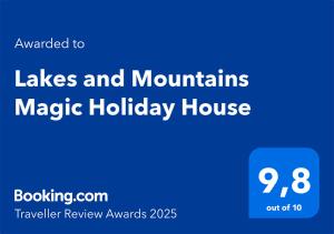 a blue sign that reads lakes and mountains magic holiday house at Lakes and Mountains Magic Holiday House in Omegna