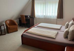 Postel nebo postele na pokoji v ubytování Akzent Hotel Goldener Ochsen + 21 fotografií