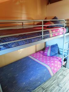 Camping des vignes客房内的一张或多张床位