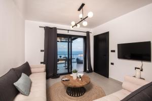 TV a/nebo společenská místnost v ubytování Gestema Luxury Residences