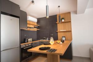 Kuchyň nebo kuchyňský kout v ubytování Gestema Luxury Residences
