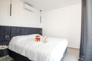 Postel nebo postele na pokoji v ubytování Gestema Luxury Residences