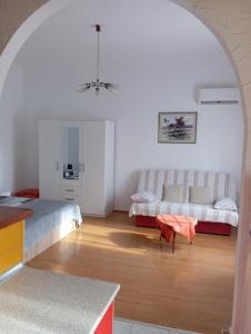 Postel nebo postele na pokoji v ubytování Studio Bella
