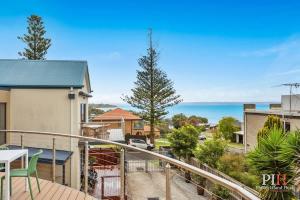 a balcony with a view of the ocean at Amazing Location with Ocean View in Cowes