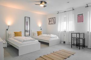 Postel nebo postele na pokoji v ubytování EasyOne Apartments