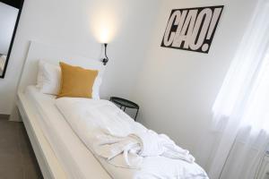 Postel nebo postele na pokoji v ubytování EasyOne Apartments