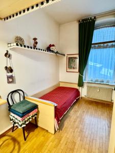 Giường trong phòng chung tại La tua Casa a Tarvisio