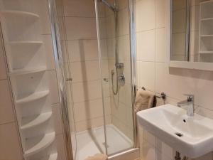 Koupelna v ubytování Fiore Gästezimmer + 20 fotografií