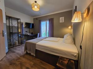 Postel nebo postele na pokoji v ubytování Aparthotel Fairschlafen Minden
