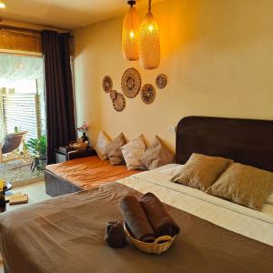Postel nebo postele na pokoji v ubytování Bamboo Beachfront Koh Larn Island + 37 fotografií