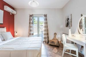 Кровать или кровати в номере Villa Andreas Kefalonia