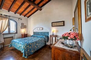 Postel nebo postele na pokoji v ubytování Bed Breakfast La Paggeria