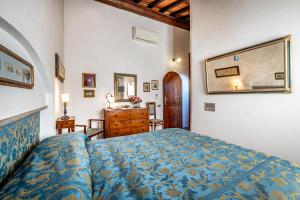 Postel nebo postele na pokoji v ubytování Bed Breakfast La Paggeria