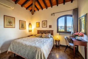 Postel nebo postele na pokoji v ubytování Bed Breakfast La Paggeria