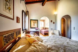 Postel nebo postele na pokoji v ubytování Bed Breakfast La Paggeria