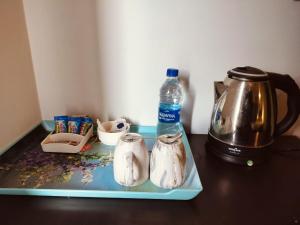 Kaffe- og tefaciliteter på Vrindavan suites at omaxe enternity