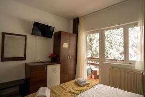 Fotografie z fotogalerie ubytování Villa Select v destinaci Predeal