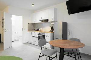 Kuchyň nebo kuchyňský kout v ubytování EasyOne Apartments + 37 fotografií