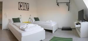 Postel nebo postele na pokoji v ubytování EasyOne Apartments