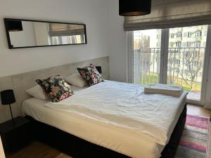 Posteľ alebo postele v izbe v ubytovaní Apartments Bliska Residence
