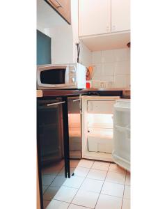 Η κουζίνα ή μικρή κουζίνα στο Po1-TPSA17-3D- ROOM Paris 17ème