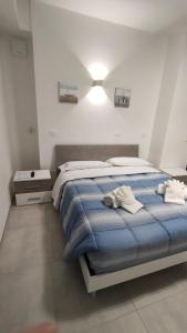 Llit o llits en una habitació de B&B-Guest house 'IN PIAZZETTA'