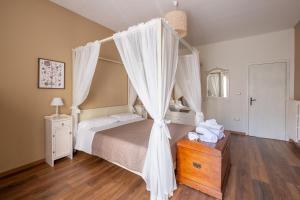 Letto o letti in una camera di Dimora Lorè