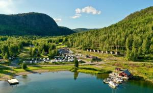 an aerial view of a river with a marina at Skuleberget Havs camping in Docksta
