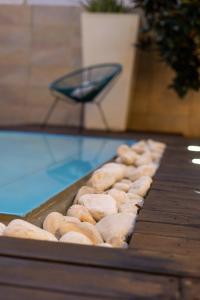 a bunch of donuts are being cooked on a grill at Villa Olimpia in Mondello