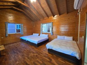 Letto o letti in una camera di Nanzhuang Haoshanhaishui B&B