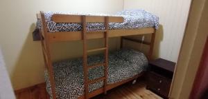 a couple of bunk beds in a room at Rincón Puyehue Primer Nivel in Puyehue