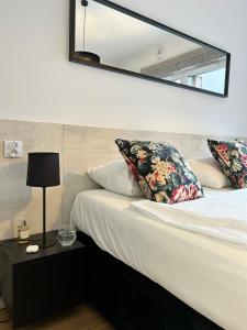 Posteľ alebo postele v izbe v ubytovaní Apartments Bliska Residence
