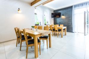 TV a/nebo společenská místnost v ubytování Hotel Palatín
