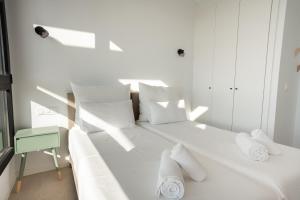 Pure Sea Apartments Villajoyosa客房内的一张或多张床位