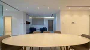 a meeting room with a table and chairs at Vivo Mare Beachfront Villas - Seashell in Ayia Napa +91 photos