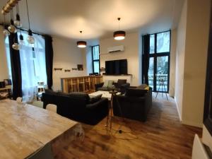 Et opholdsområde på Appartement 4 chambres avec terrasse