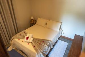 Vila Mani Atins Casa com Piscina客房内的一张或多张床位