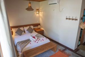Vila Mani Atins Casa com Piscina客房内的一张或多张床位