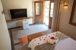 Vila Mani Atins Casa com Piscina客房内的一张或多张床位
