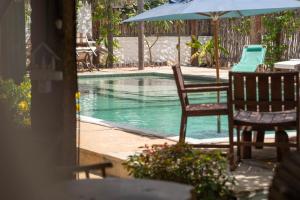 Vila Mani Atins Casa com Piscina内部或周边的泳池