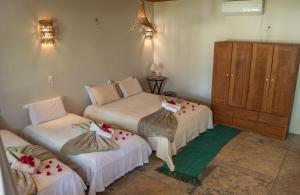 Vila Mani Atins Casa com Piscina客房内的一张或多张床位