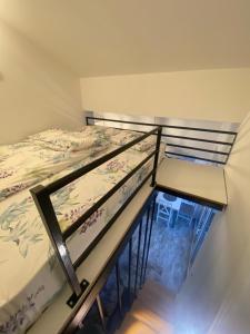 Una cama o camas en una habitación de Apartman Leona A3