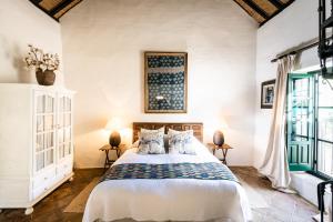 Postel nebo postele na pokoji v ubytování Hacienda de San Rafael + 73 fotografií