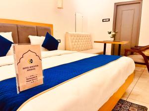 Postel nebo postele na pokoji v ubytování Pause Roll INN