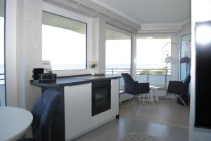 Η κουζίνα ή μικρή κουζίνα στο Haus Hanseatic Panoramawohnung 606