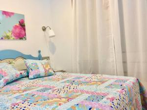 Ένα ή περισσότερα κρεβάτια σε δωμάτιο στο Apartamento Torre San Francisco +13 φωτογραφίες